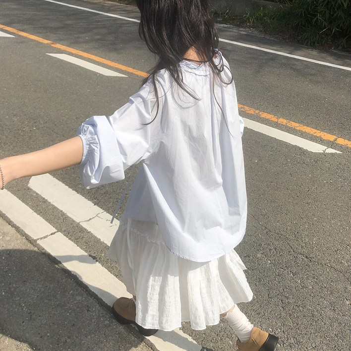 페트리코어 벨라 루즈핏 프릴 스트링 블라우스